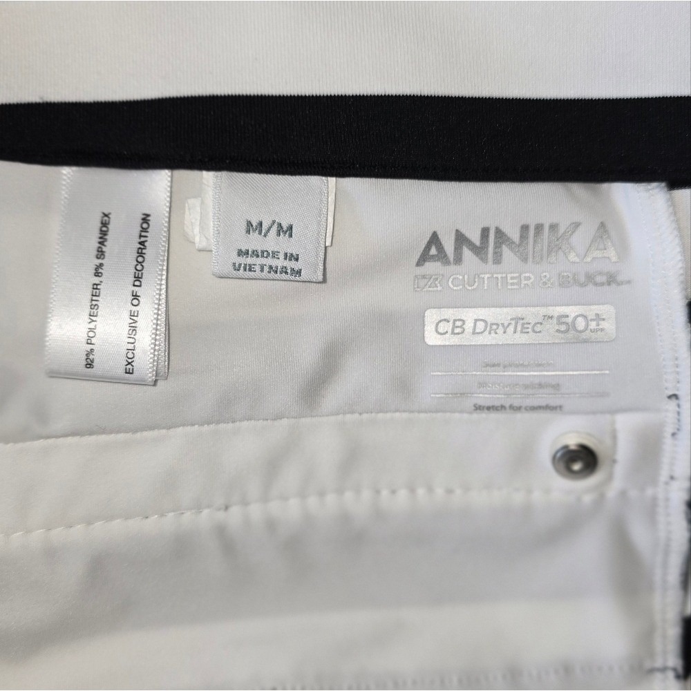 Anikka‎ - 🏓 Sporty Black and White Striped Skirt with Green Zip - Picture 4 of 9